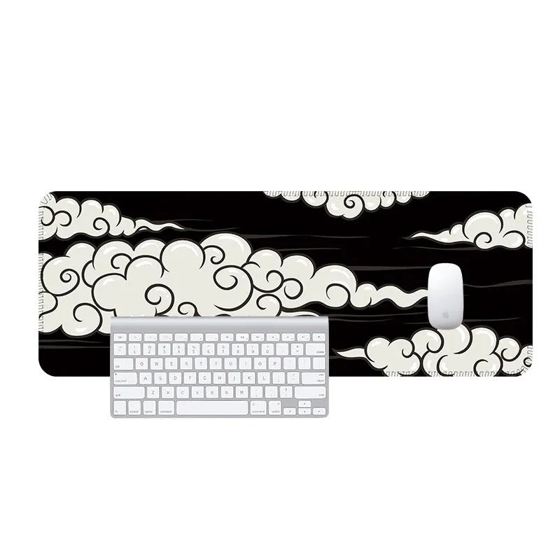 Large cloud pattern desk mat made of natural rubber on a wooden desk.