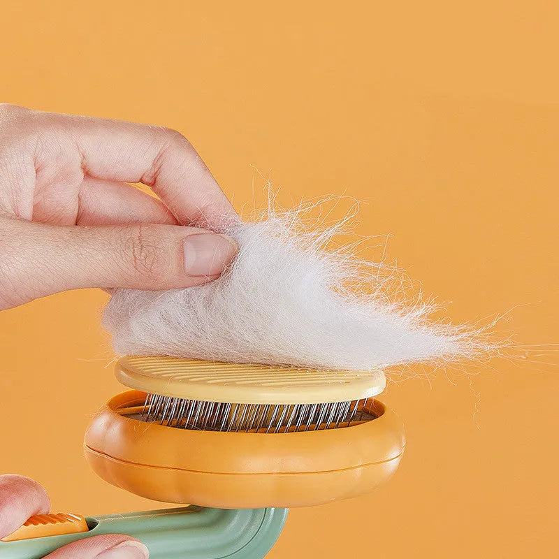 Pet grooming brush with curved steel wire teeth in white or pumpkin colour for cats and dogs