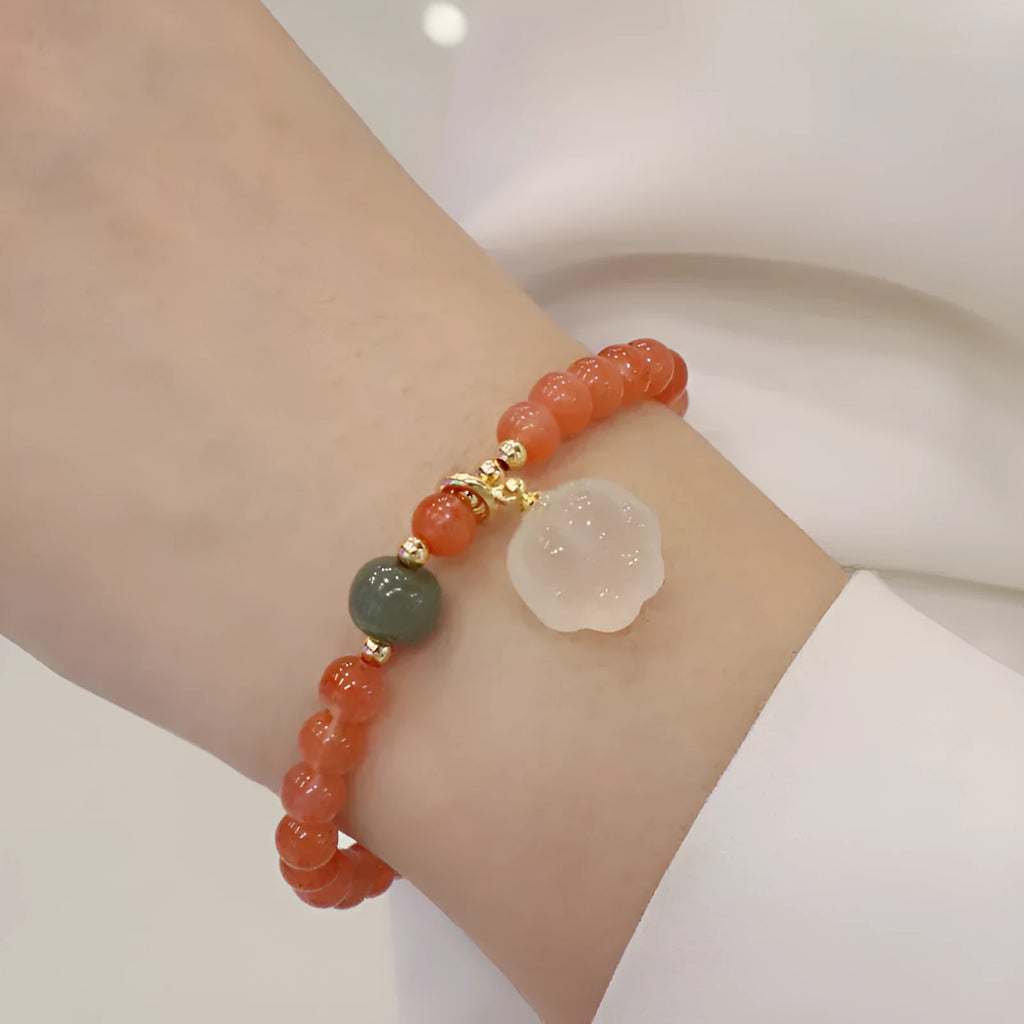 Red agate women's bracelet with cat's paw charm and jade inlay on 6mm band