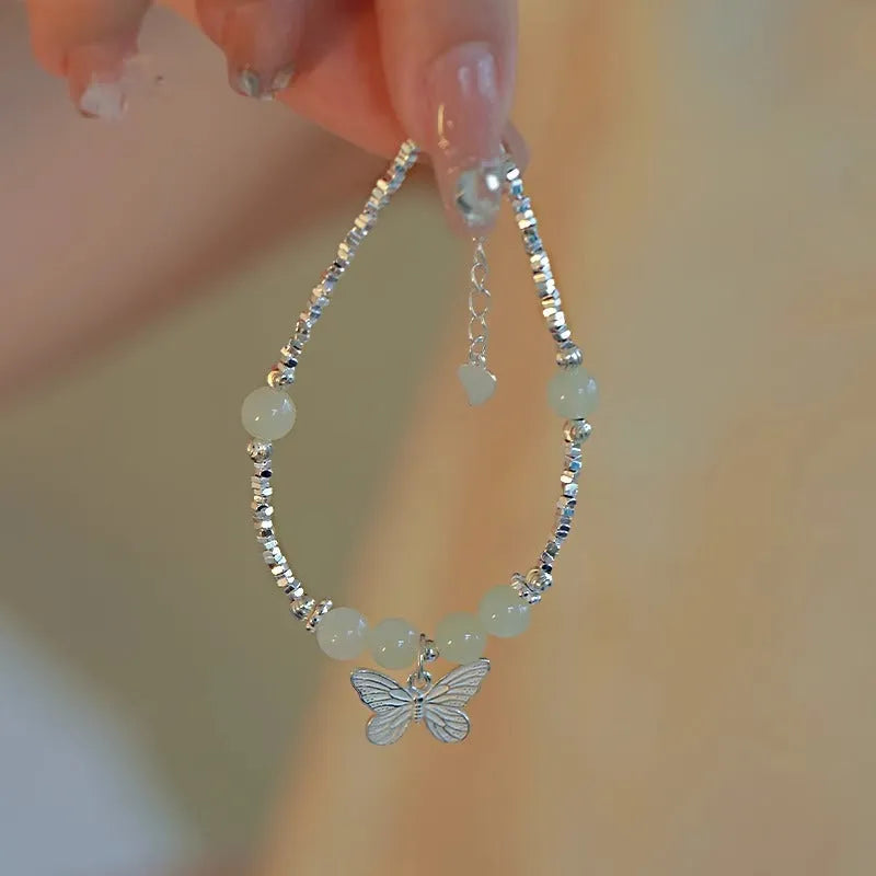 Hetian jade silver butterfly bracelet and necklace set with electroplated copper construction