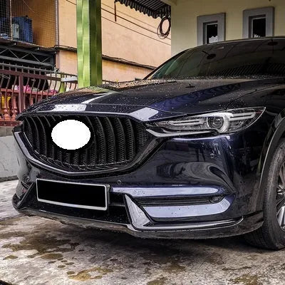 Mazda CX-5 second generation car with medium mesh GT sports front grille decoration installed.