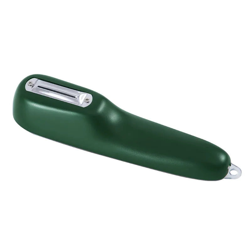 Dark green kitchen peeler with storage tube and stainless steel blade on a kitchen counter.