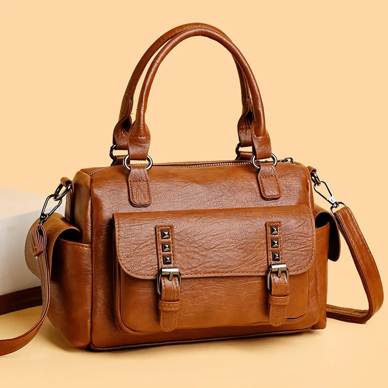 Vintage style messenger bag in PU leather, shown in a horizontal square shape with contrast stitching.