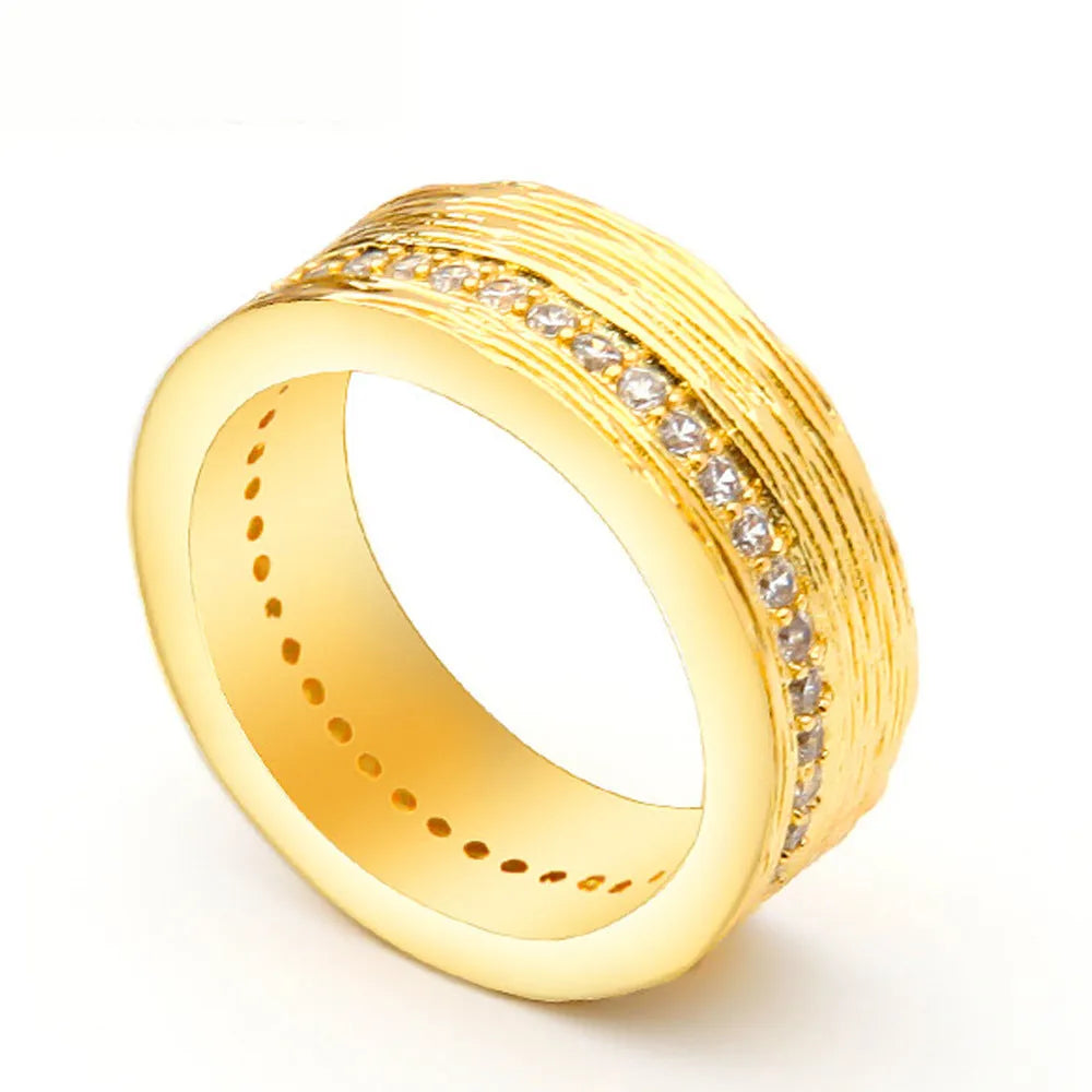 Gold geometric copper zircon ring for women on a white background.