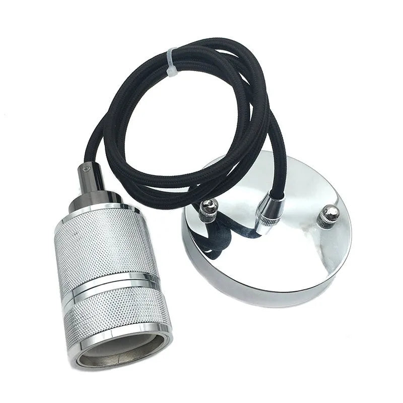 Components of a DIY retro ceiling light assembly kit in chrome finish, showing metal ceiling rose, braided cord, and lamp holder.