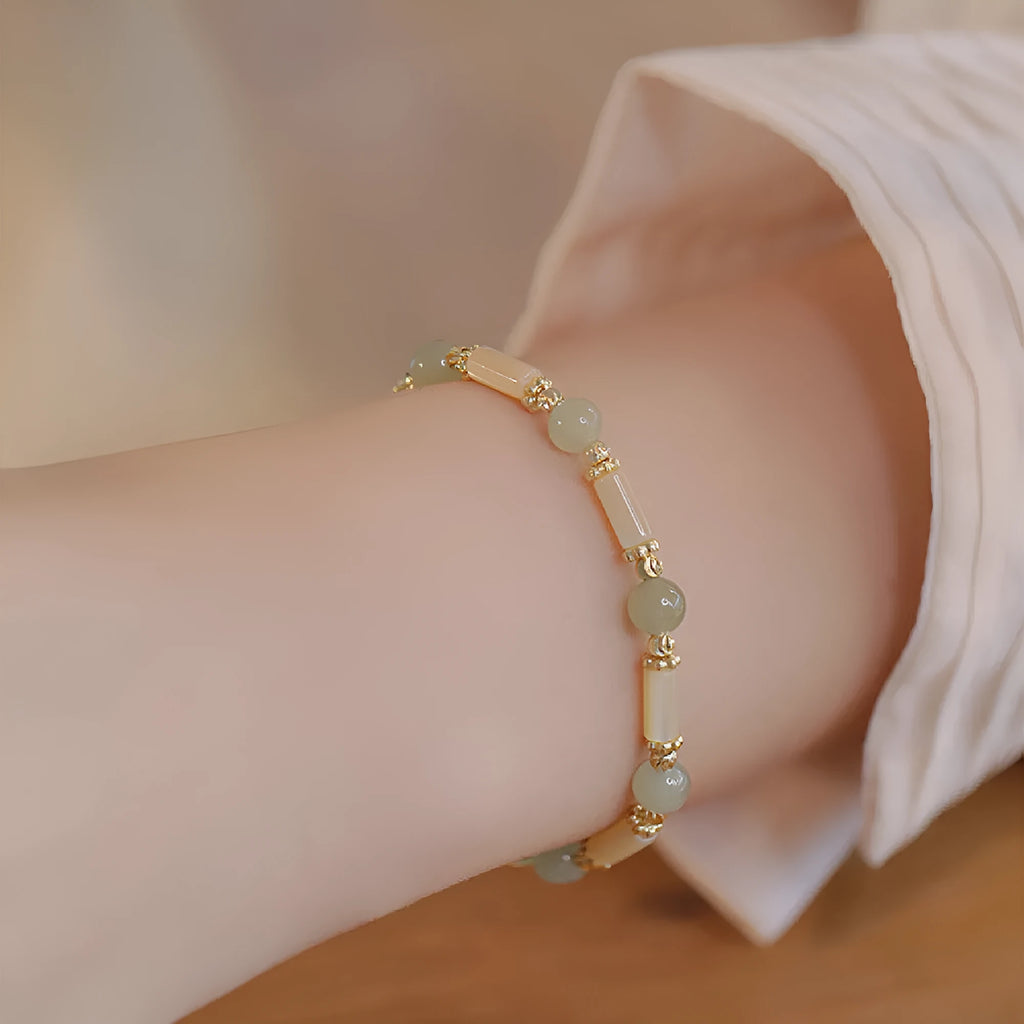 Women's bamboo joint Hetian jade bracelet in 6mm size showing natural stone beads