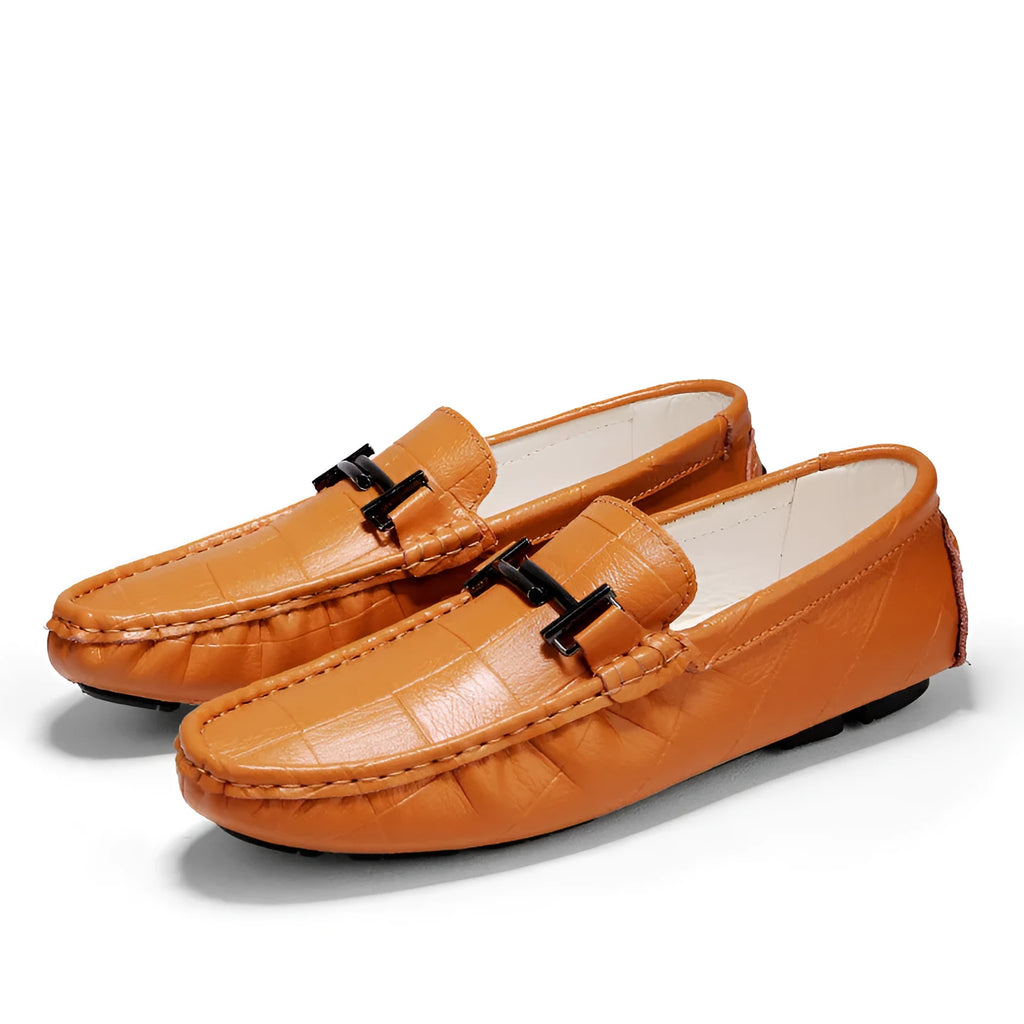 Men's casual leather loafers with buckle detail in multiple colour options showing leather upper and rubber sole