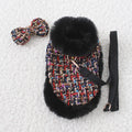 Classic cloth dog cloak attached to a chest harness with a hand-held traction rope lead.