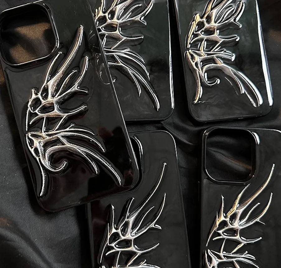 Black iPhone case with a blurred, three-dimensional wings design on the back.