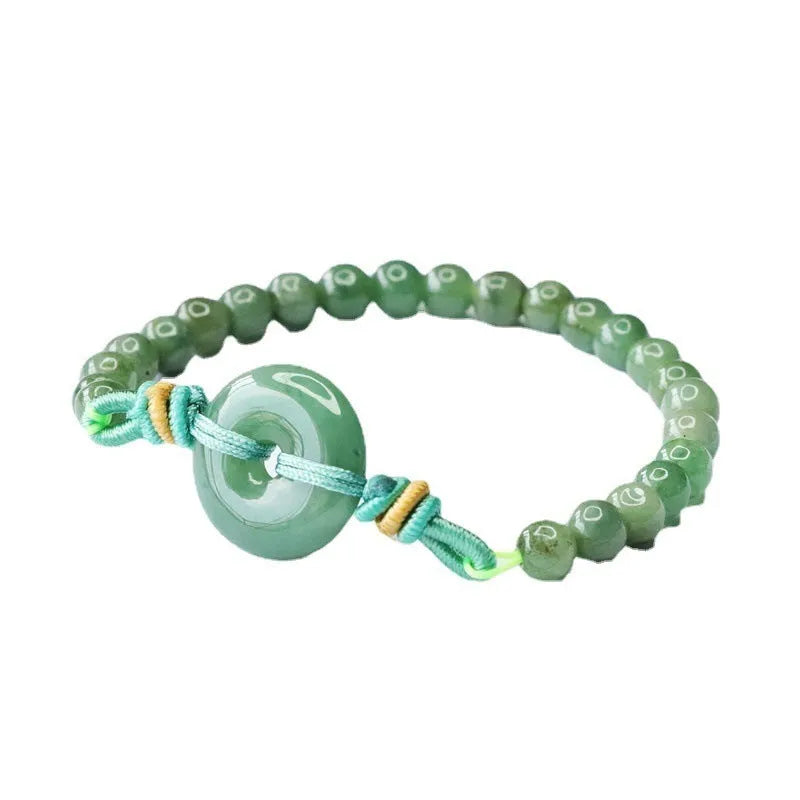 Oil green jade bracelet with safety buckle closure showing star-shaped 6mm beads