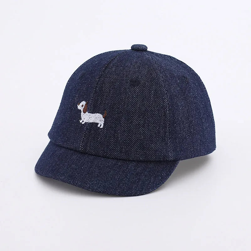 Baby denim baseball cap with puppy patch in light blue, dark blue, and black colour options.