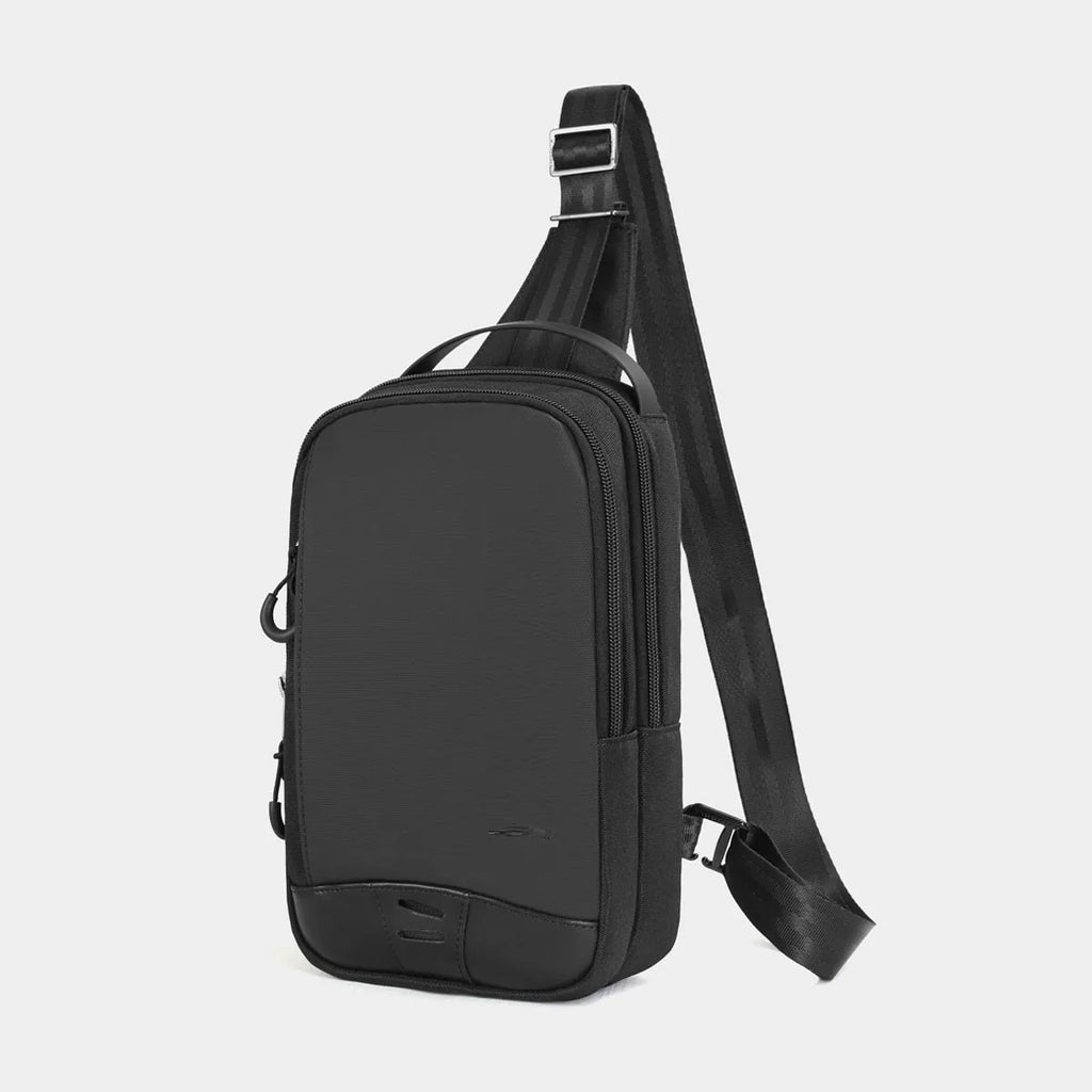 Casual black TPU camouflage chest bag with a single shoulder strap and soft handle, showing a square vertical shape and outer sandwich pocket.