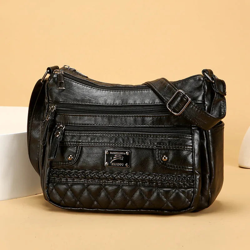 Soft PU leather shoulder bag in wine red with wash finish and outer pocket, 26x19x8cm
