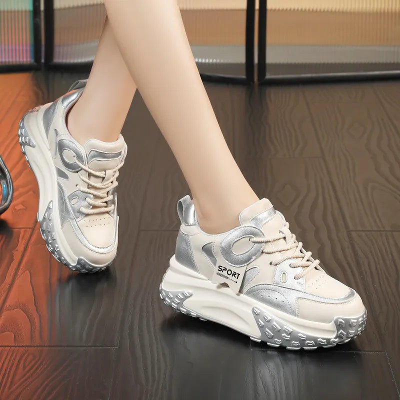 Women's silver leather casual shoes with a thick wedge sole and front laces.