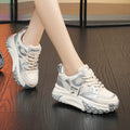 Women's silver leather casual shoes with a thick wedge sole and front laces.