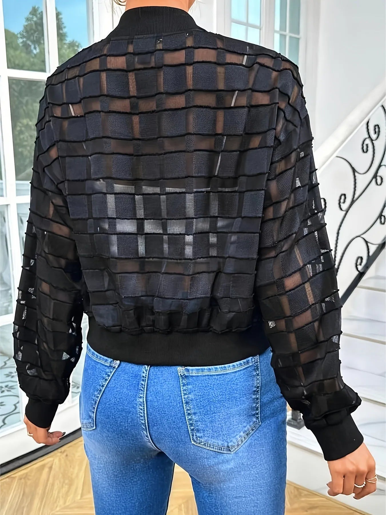 Black women's casual jacket with geometric pattern and thread zipper in semi-transparent polyester