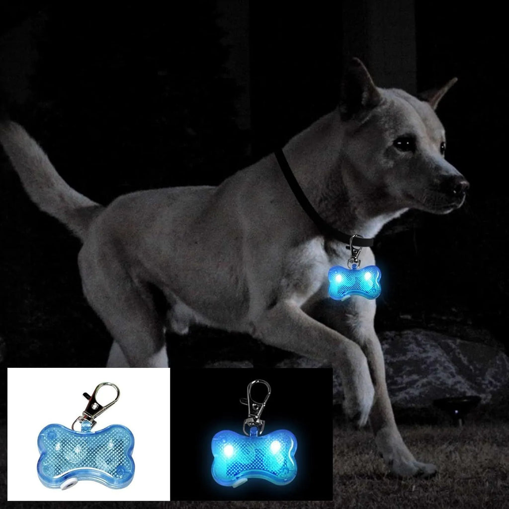 Blue LED luminous bone-shaped pendant for pet collars, shown with LR44 batteries.
