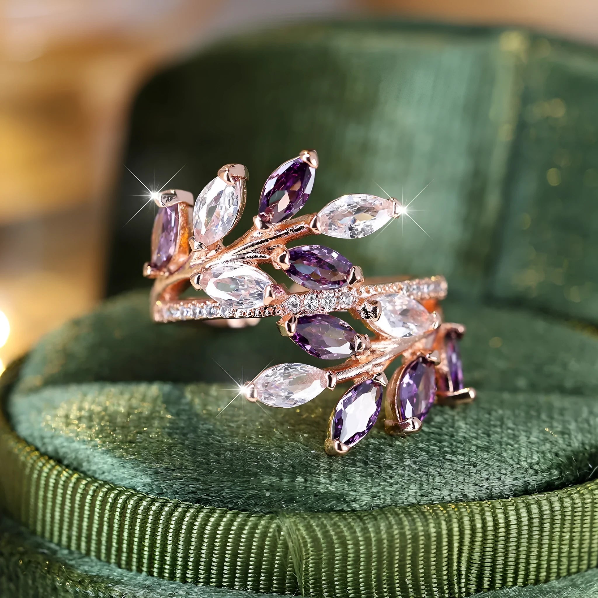 Adjustable copper leaf-shaped ring with a central horse eye zircon stone, shown in a rose gold finish.