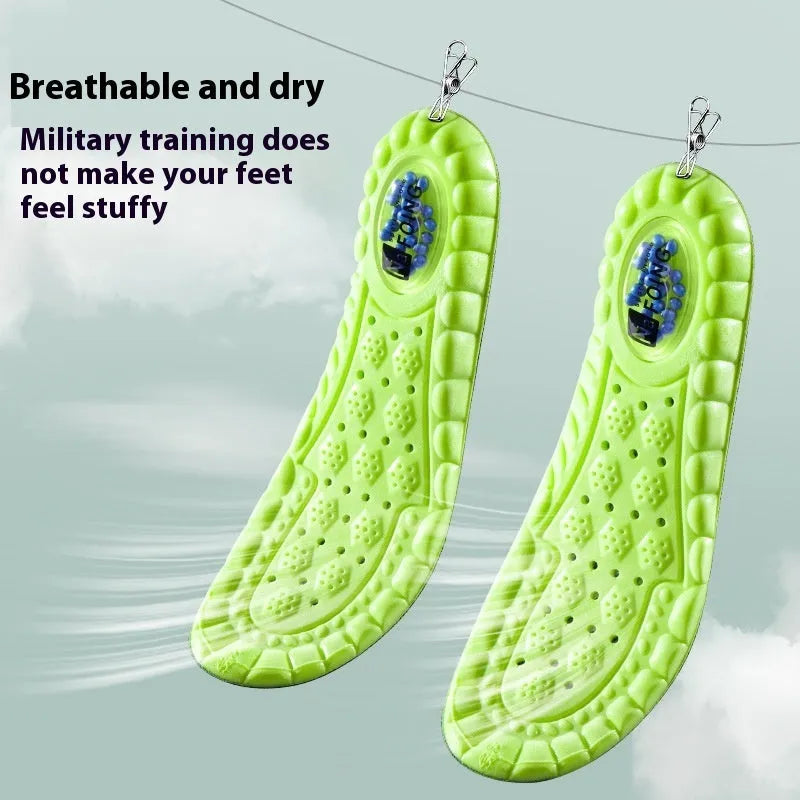 Green PU sports insoles with air cushion shock absorption and argy wormwood lining on a white background
