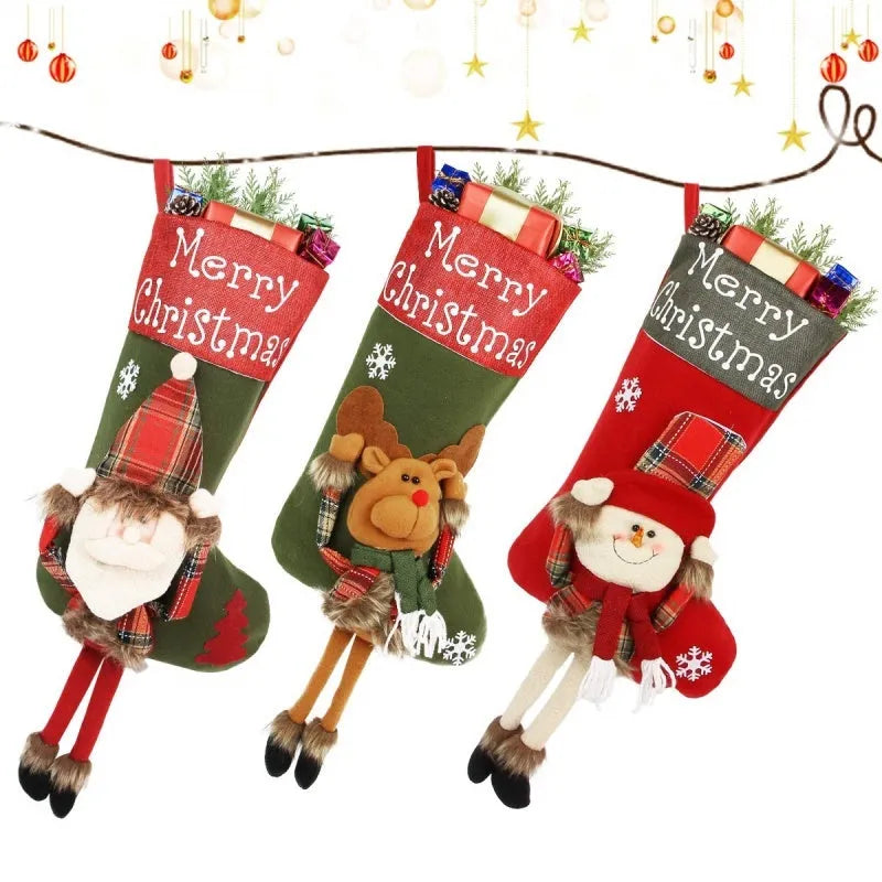 Set of three large red, white, and brown Christmas stockings featuring 3D Santa, Snowman, and Reindeer designs with hanging loops