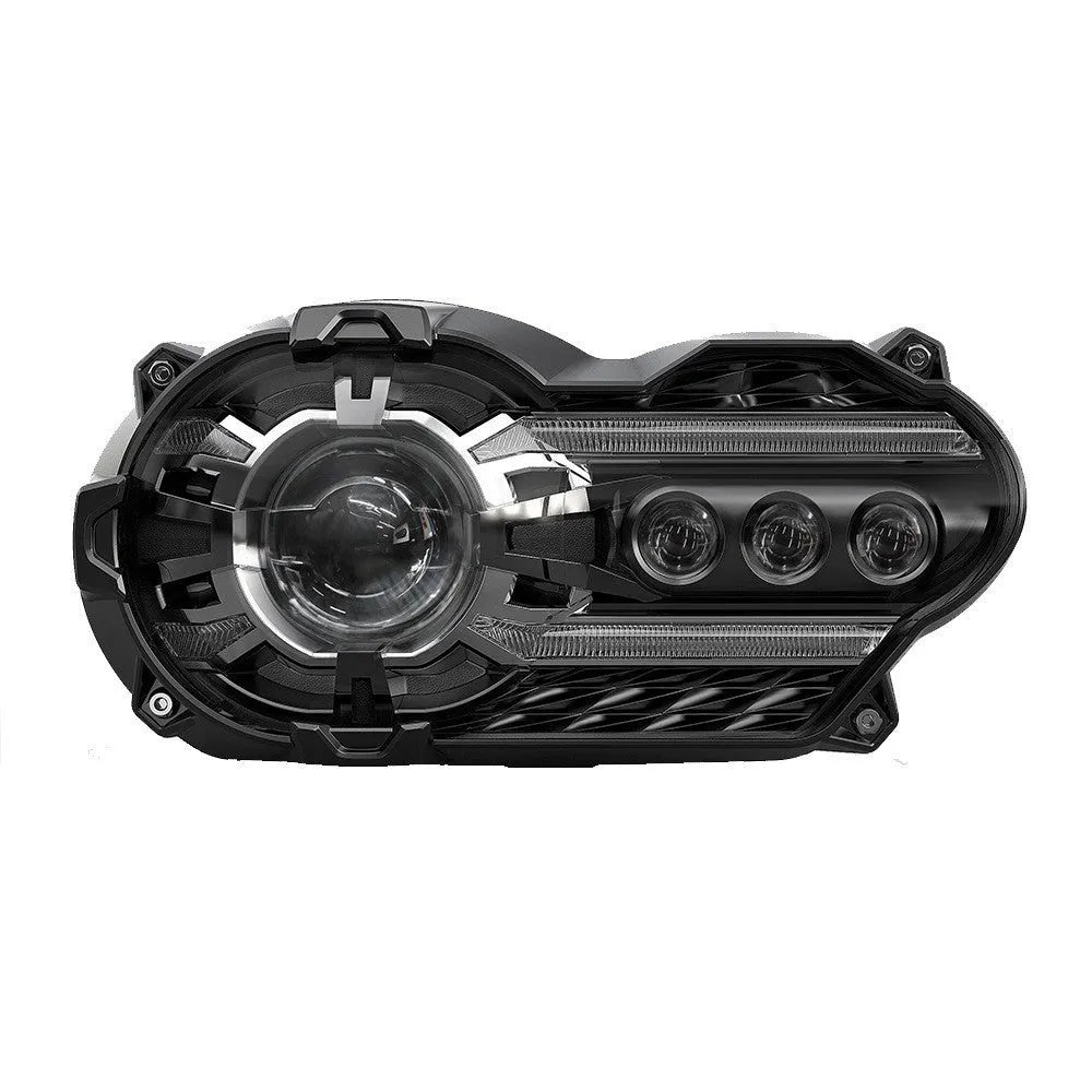 Black background LED motorcycle headlight unit showing front lens and housing.