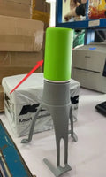 Uutensil Stirr automatic pot mixer device in green colour for hands-free stirring of sauces and soups.