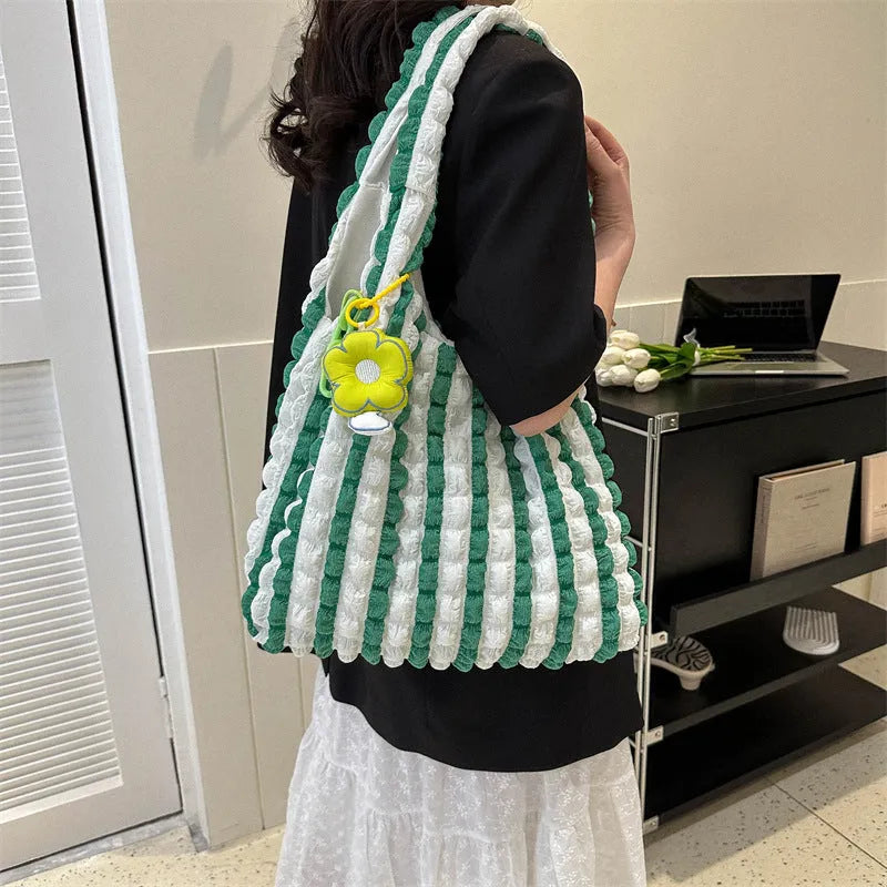 Women's pleated bubble crossbody bag in soft polyester with pendant accessory in vertical square design