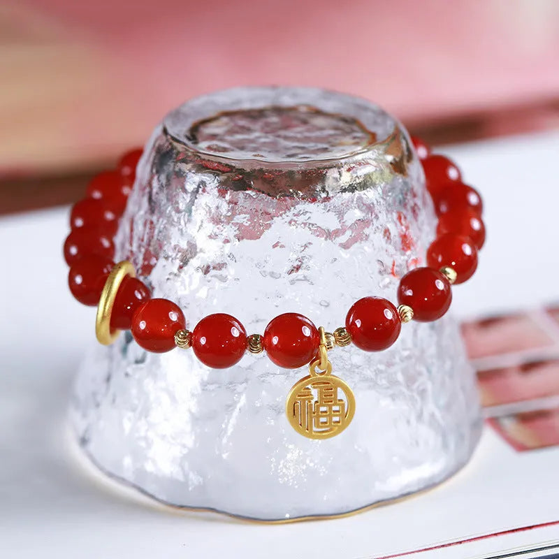 Natural red agate bracelet with woven beads in national style, showing 8MM and 10MM size options with blessing card.