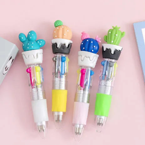 Cartoon Cute Object four-colour press ballpoint pen with random design showing 0.7mm tip.
