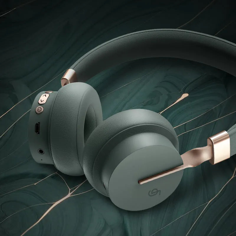 Simple solid colour headworn Bluetooth phone stereo headset showing multiple colour options