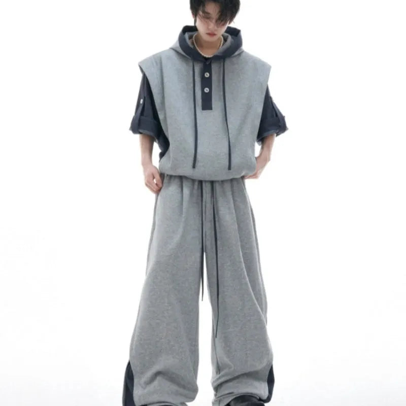 Heavy industry sports leisure suit set showing hooded polyester sweatshirt with three-dimensional stitching and matching trousers