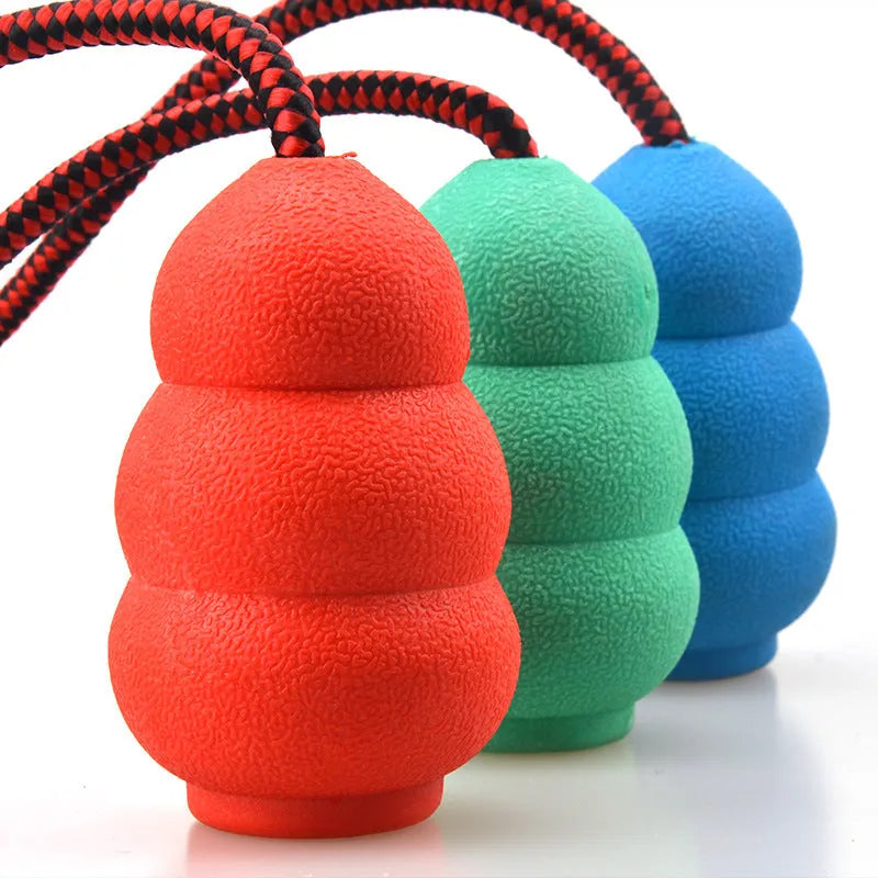 Rubber rope hoist pet toy with ball and rope in mixed colour hair, shown in 9cm small and 12cm large sizes