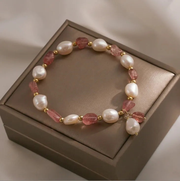 Handmade strawberry quartz crystal bracelet for women showing green strawberry quartz moon design.