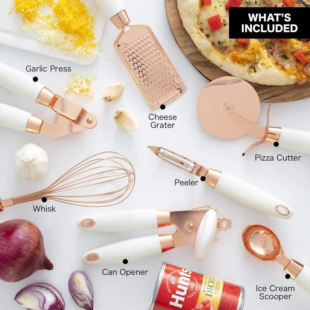 Stainless steel kitchen gadget 7-piece set with various bottle openers and a can opener in a box.