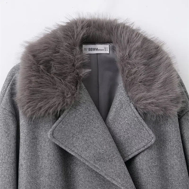 Women's grey mid-length hooded belted wool cape coat with faux fur collar, long sleeves, patch pockets