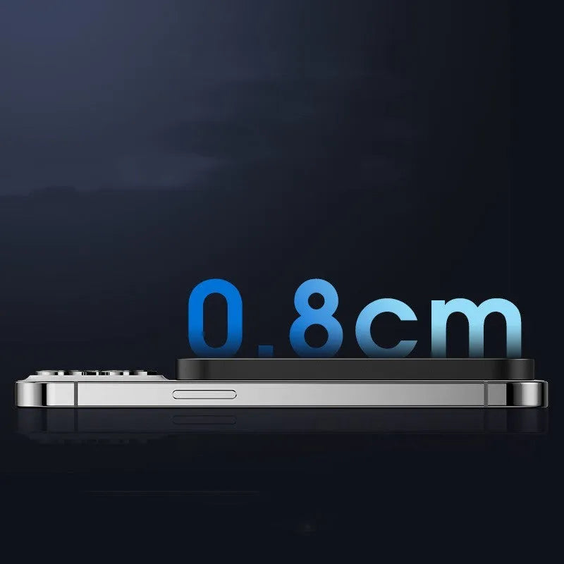 Titanium gold and black magnetic wireless alloy power bank showing magnetic ring for phone attachment.