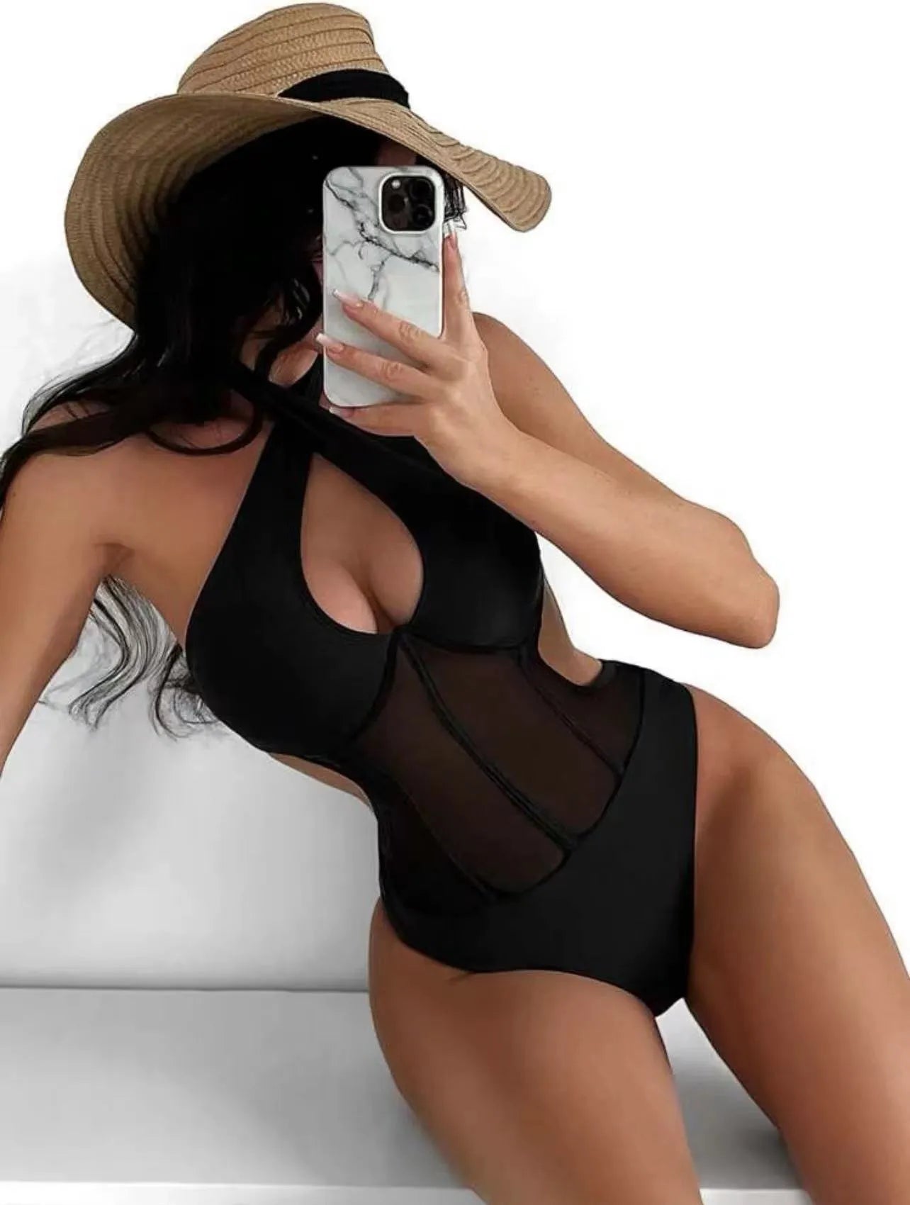 Women's black one-piece spun yarn swimsuit on a mannequin