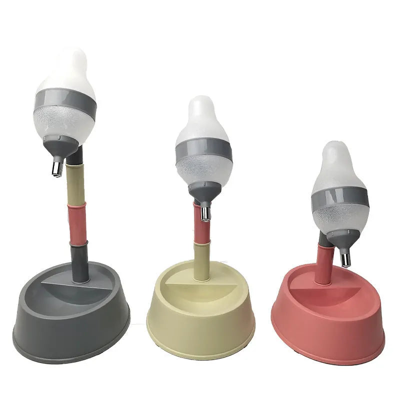 Green adjustable standing water dispenser for pets with detachable pole and ball-tip nozzle on a stable base.