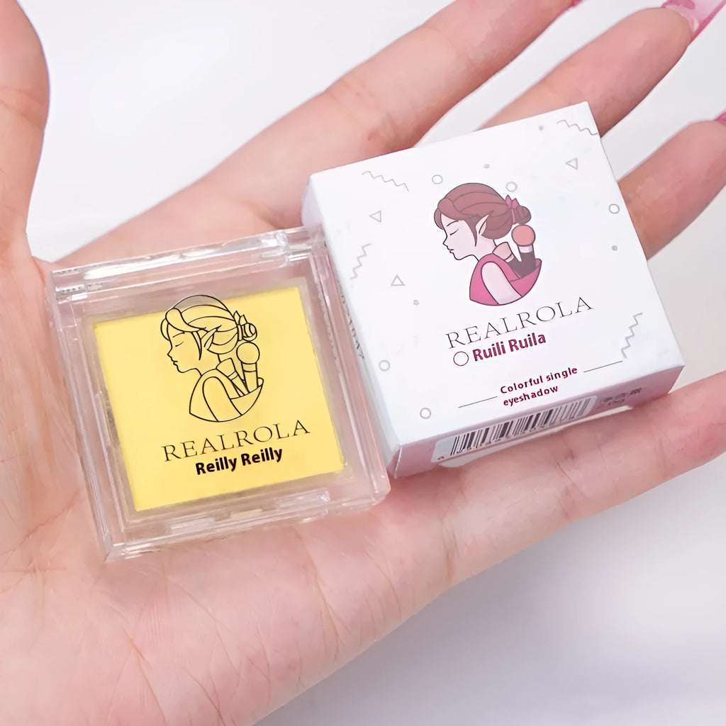 Single pan of bright yellow matte monochrome eyeshadow showing 2g net content on label.