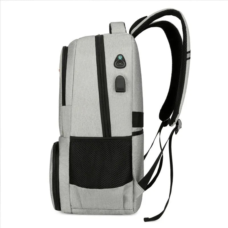 Light grey Oxford cloth insulated backpack with curved shoulder straps and a pull rod belt.
