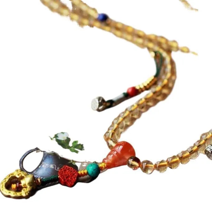 Brazilian natural citrine bracelet with yellow and red body colour, 1mm bead diameter