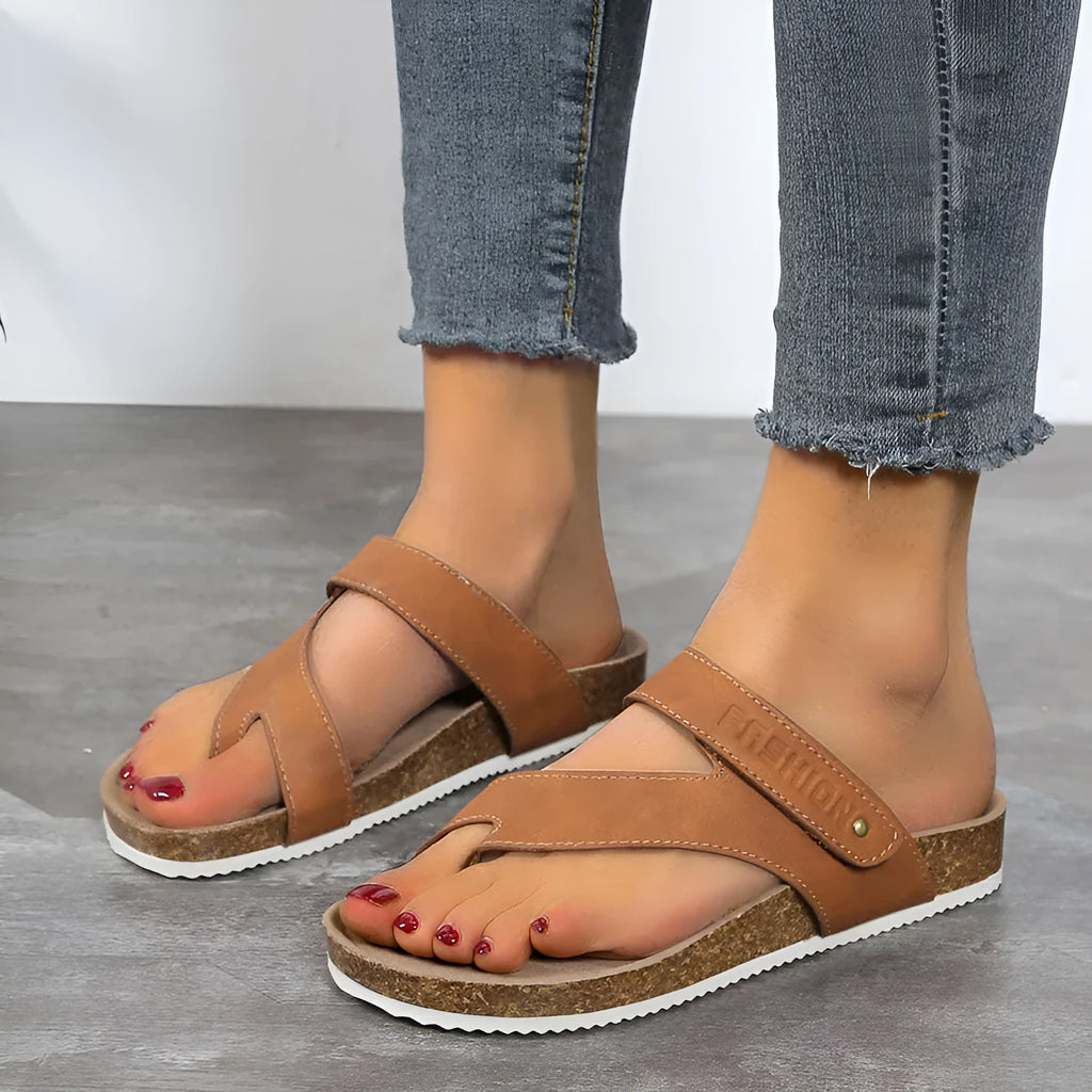 Flat toe ring thick-soled flip-flops in a solid colour with a foam sole and artificial PU upper.