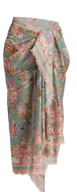 Women's creamy-white floral bikini set with matching skirt for beach holidays