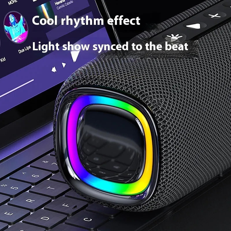 Outdoor portable wireless Bluetooth speaker in gray with cloth grille and button controls, 4000mAH battery