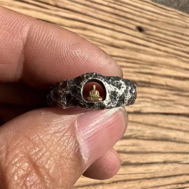Hand-forged copper grotto Buddha ring with a rock texture surface, shown in size 8.