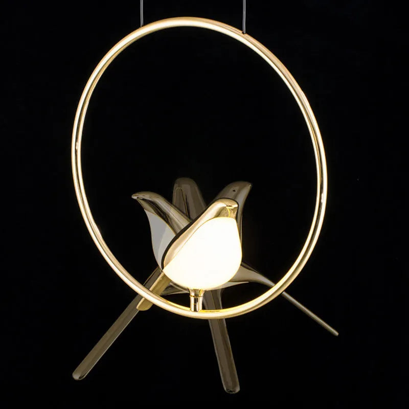 Modern silver magpie bird chandelier with long 150cm drop and clear acrylic details, hanging from a ceiling.