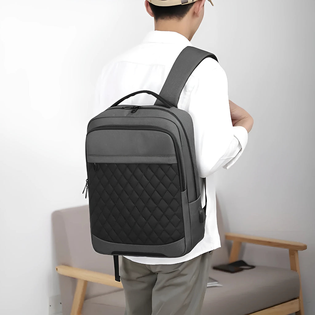 Men's leisure travel backpack in Oxford cloth with curved shoulder straps and diamond mesh back panel