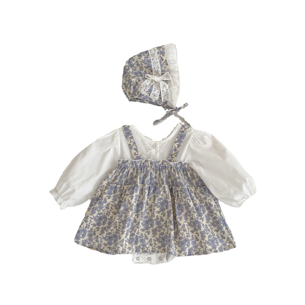 White cotton baby girls' floral princess romper with long sleeves, pullover closure, and removable hood in triangle jumpsuit style