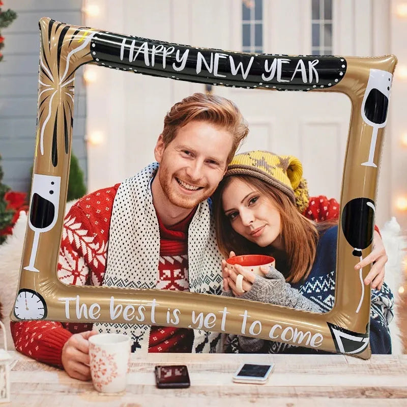 Large red and green Christmas inflatable photo frame prop on white background