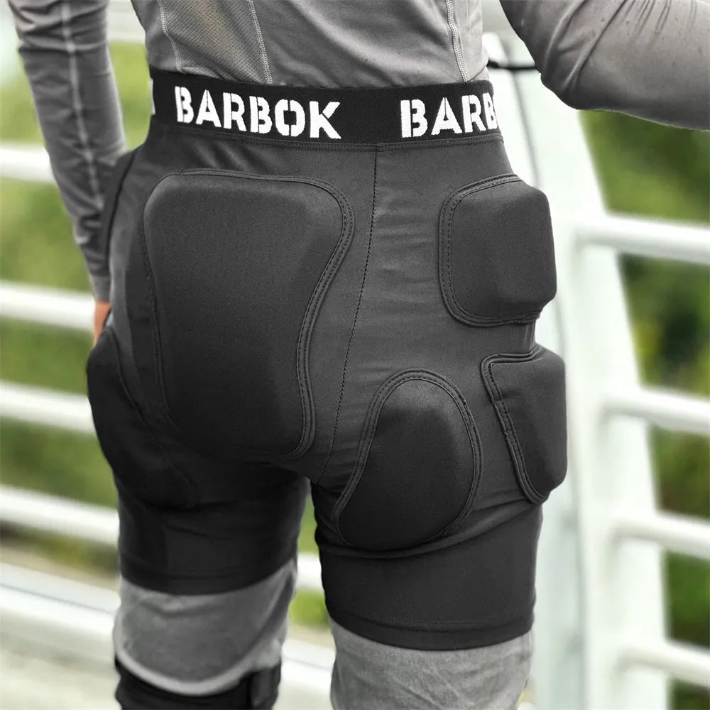 Black roller skating hip protection pants with NBR foam padding for fall safety